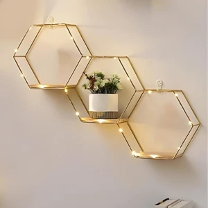 Repisa Panal Dorada de Pared Hexagonal - Organiza tus objetos decorativos en la pared