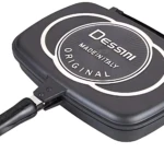 Sarten doble parrilla antiadherente Dessini en color negro, con asa ergonómica y tapa abatible, ideal para cocinar dos platos al mismo tiempo.