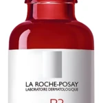 Serum antiarrugas Retinol B3 de La Roche-Posay en frasco de vidrio rojo con gotero blanco, etiqueta blanca con texto negro y azul.
