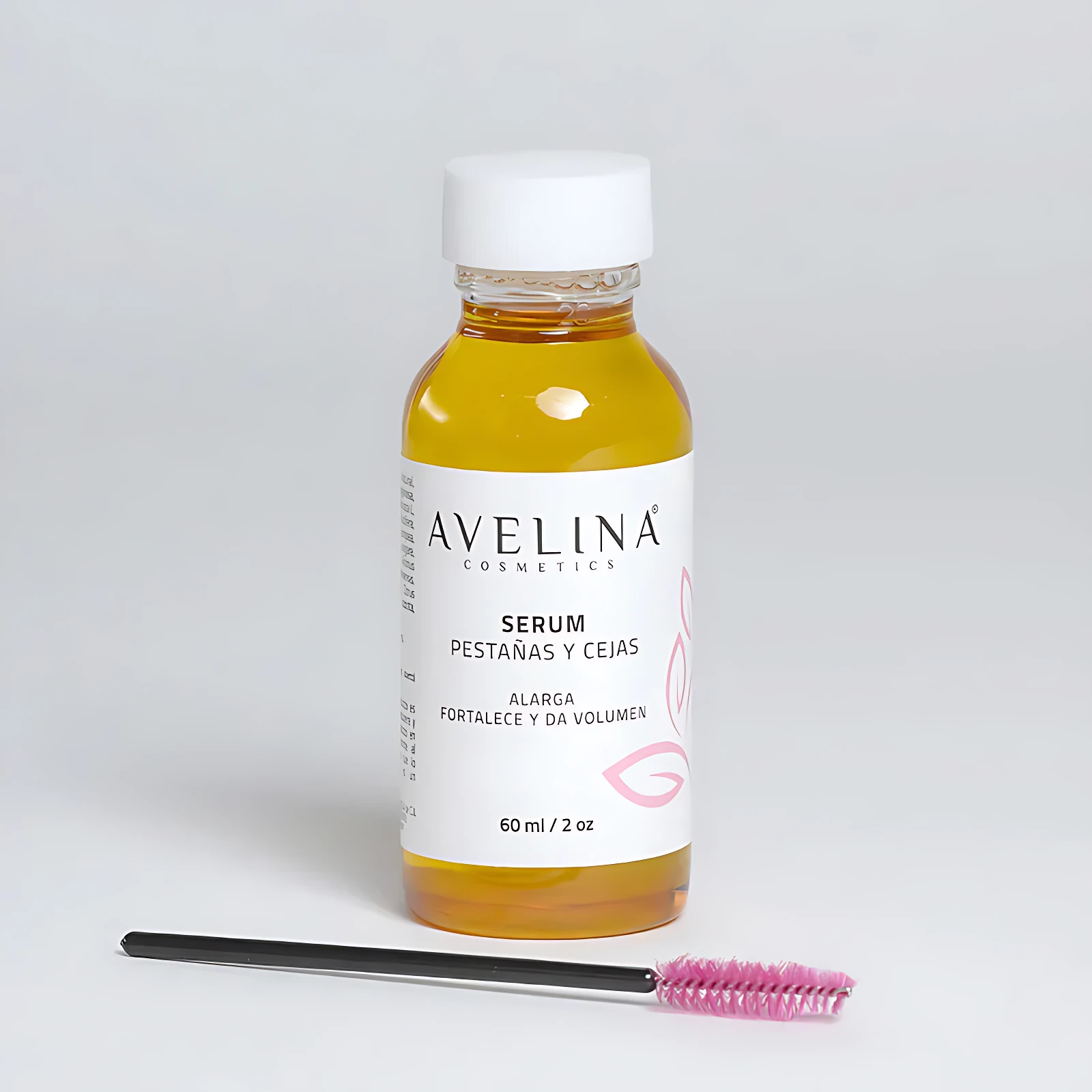 Bote de 60 ml de serum Avelina para pestañas y cejas, color ámbar, con aplicador de cerdas rosas.
