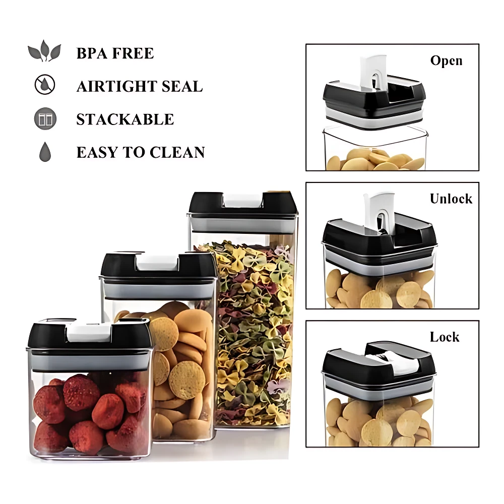 Set de tres contenedores de cocina herméticos en negro y transparente, apilables, con tapas de cierre seguro y contenido visible de galletas, pasta y frutas secas.