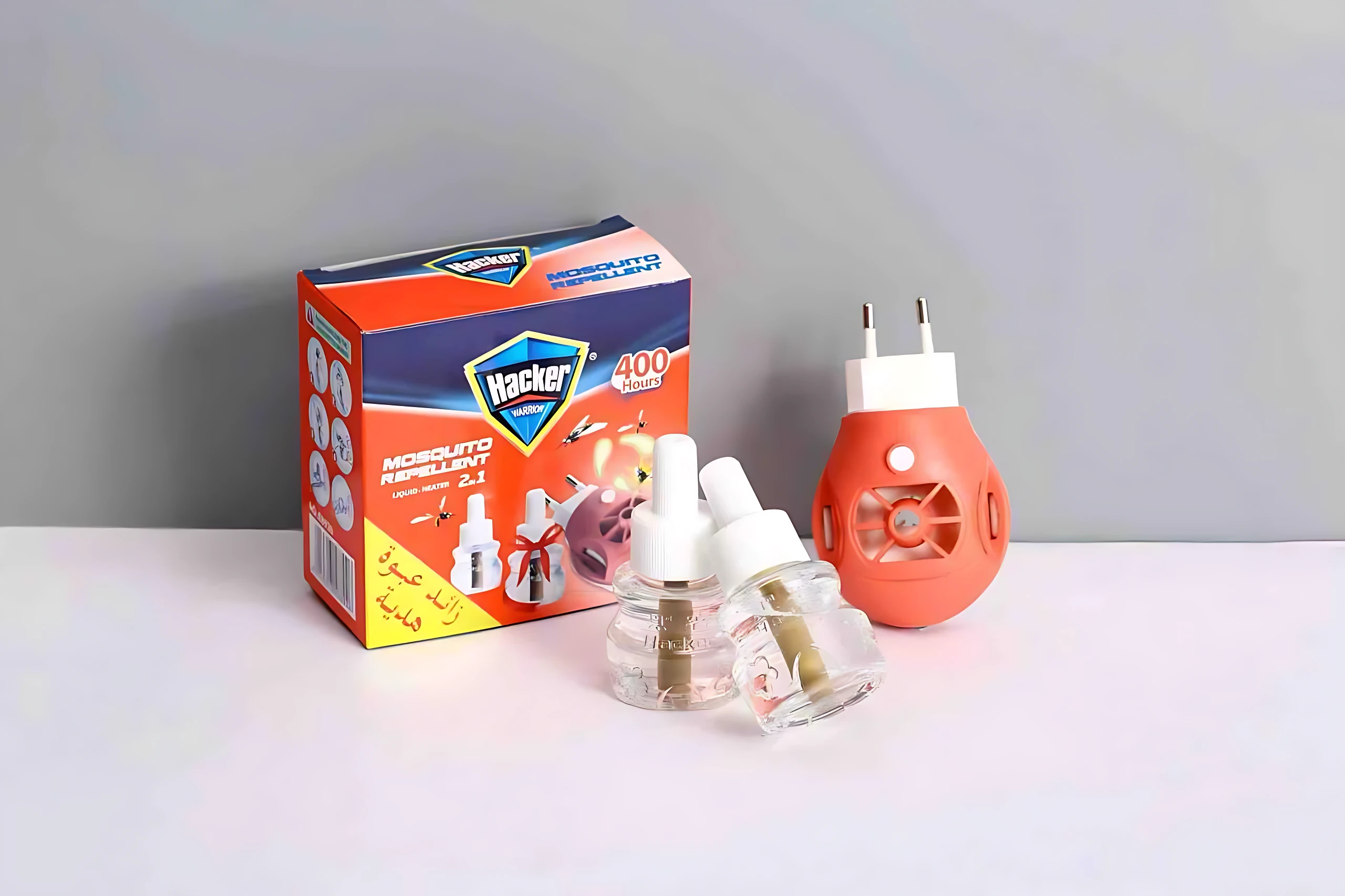 Pack de repelente eléctrico de enchufe sin humo, color naranja, con dos refills transparentes y caja original. Ideal para eliminar mosquitos en interiores.