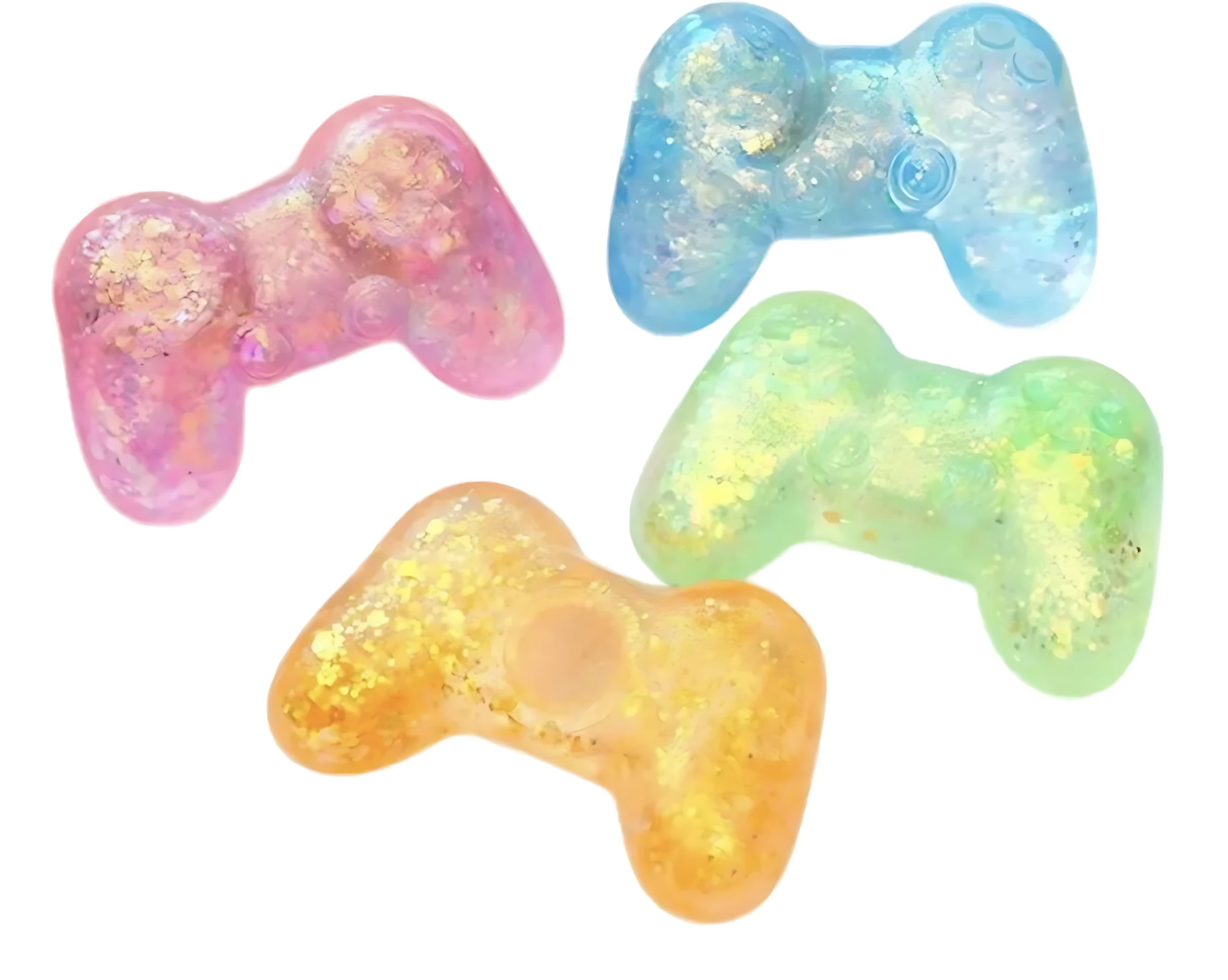 Cuatro squishies de control X12 en colores rosa, azul, verde y amarillo con brillo interior, dispuestos sobre fondo blanco.