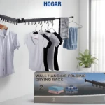 Tendedero plegable de metal negro mate montado en pared, con ropa colgada y caja del producto visible en primer plano.
