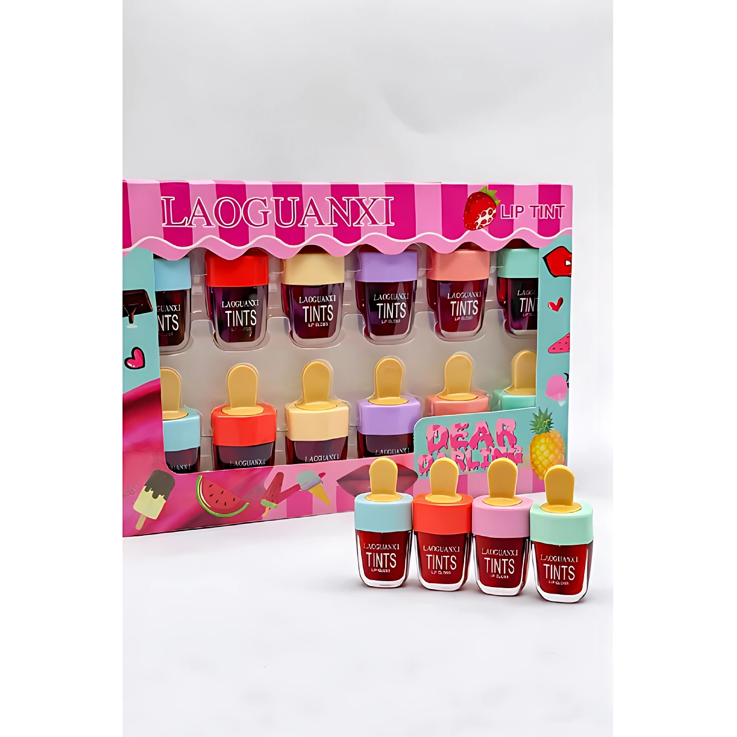 Set de tintas labiales Laoguanxi en presentación de paleta con cuatro unidades individuales, colores vibrantes y diseño de palitos de helado, acompañadas de cuatro unidades adicionales fuera del empaque.