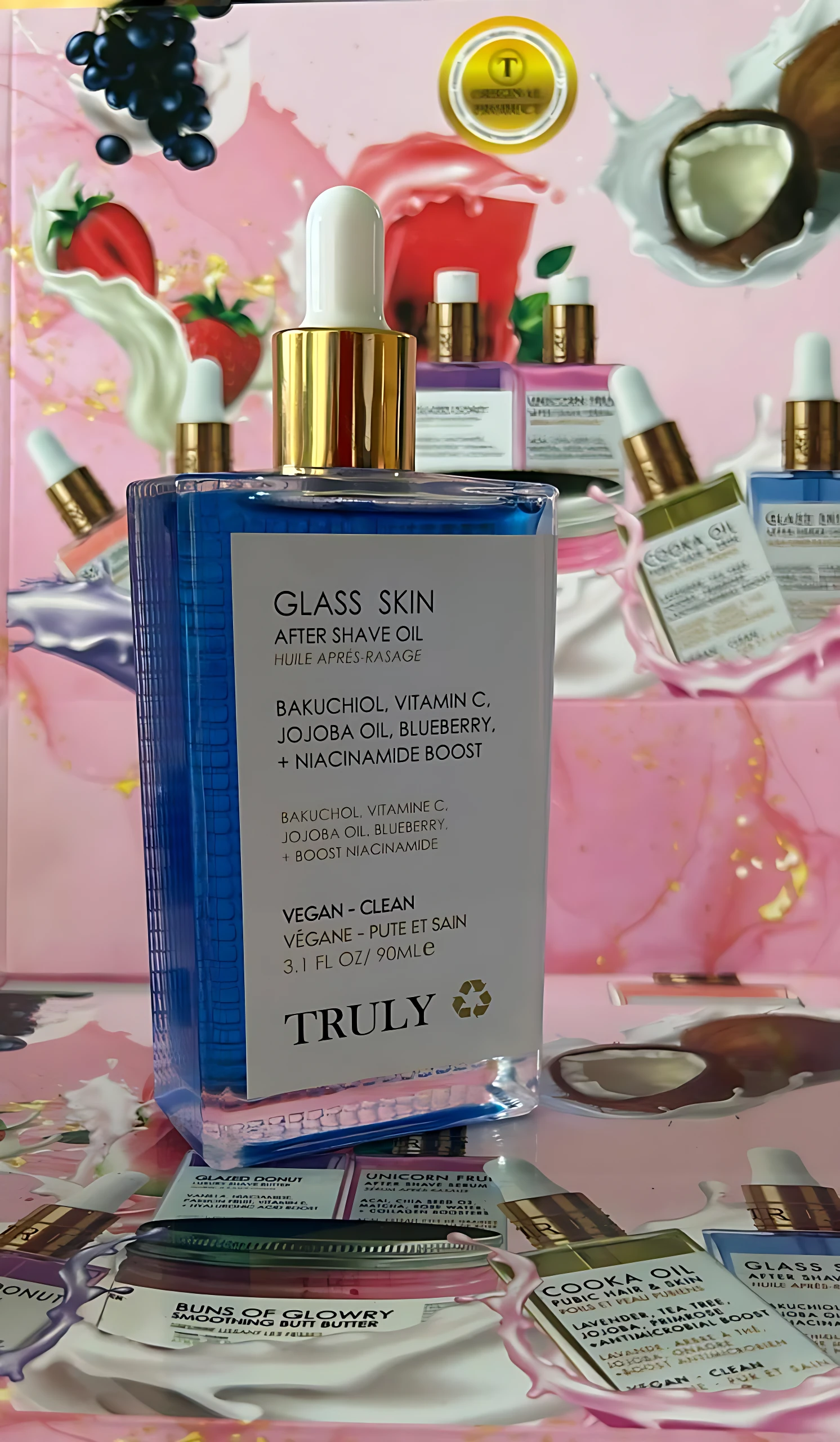 Botella de vidrio azul con tapa dorada y cuentagotas, etiquetada como Glass Skin After Shine Oil de Truly, con ingredientes visibles: Bakuchiol, Vitamina C, Jojoba Oil, Blueberry y Niacinamide Boost. Presentación en set con múltiples unidades y accesorios incluidos.