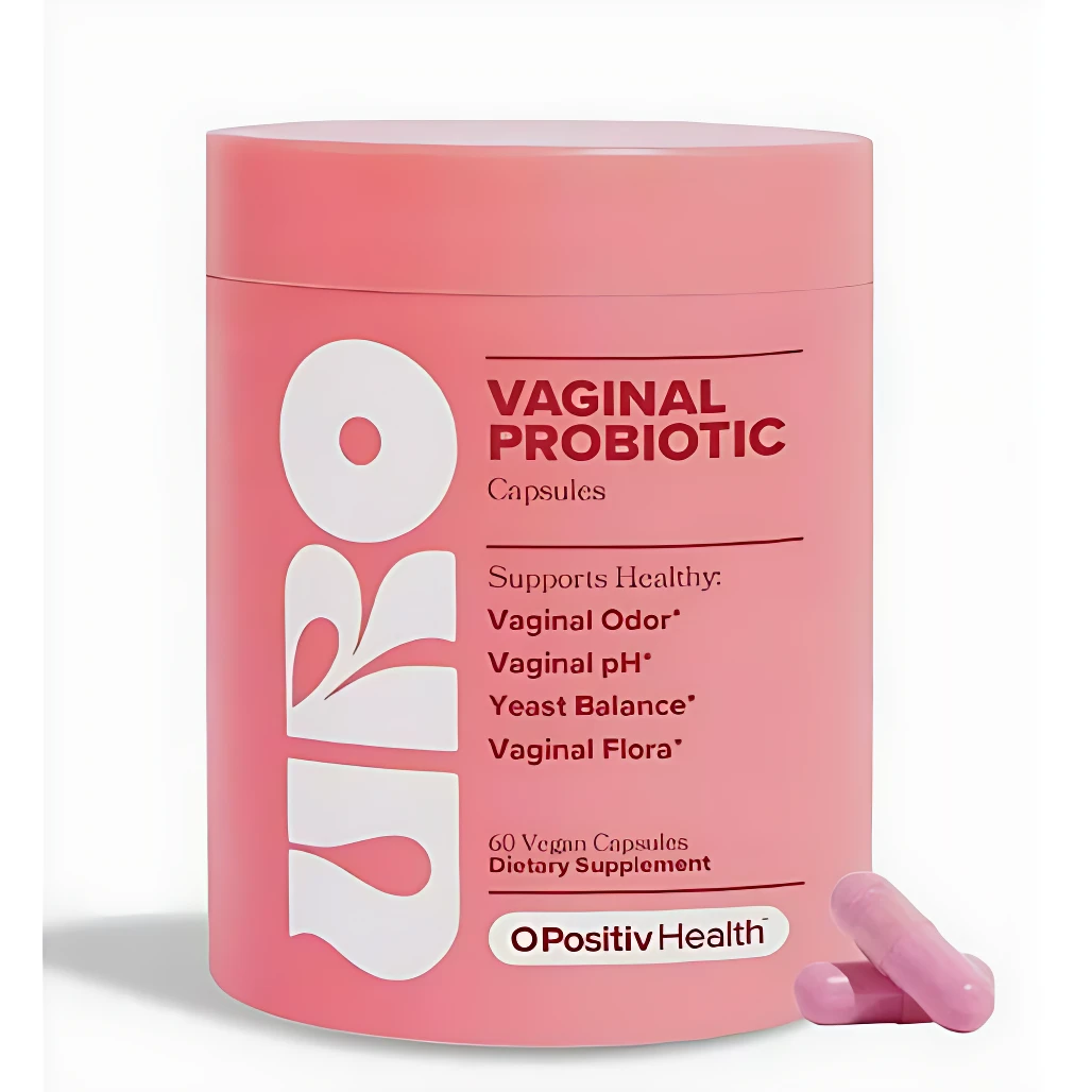 Contenedor rosa de cápsulas vaginales URO de OPositivHealth, con dos cápsulas visibles al lado. Presentación de 60 cápsulas veganas para salud íntima.