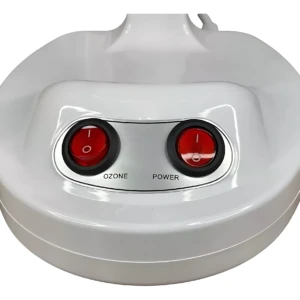 Vaporizador facial blanco con dos interruptores rojos, uno etiquetado como OZONE y el otro POWER.