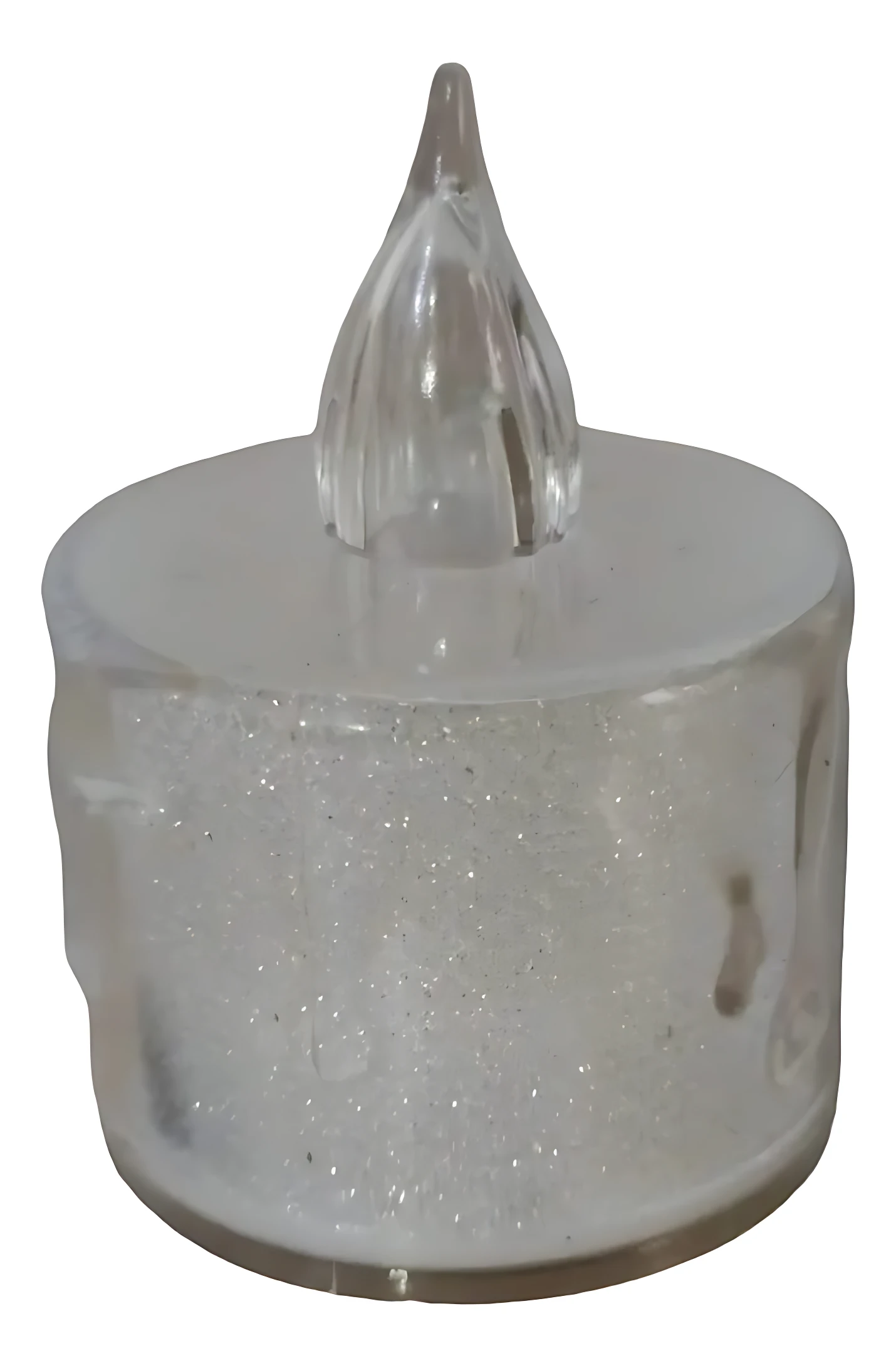 Vela LED de luz cálida con base translúcida y partículas brillantes, forma de llama en la parte superior, vista frontal.