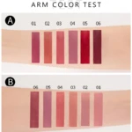 Prueba de color en antebrazo con seis tonos de labial mate nude, numerados del 01 al 06, mostrando variaciones desde rosas suaves hasta rojos intensos.