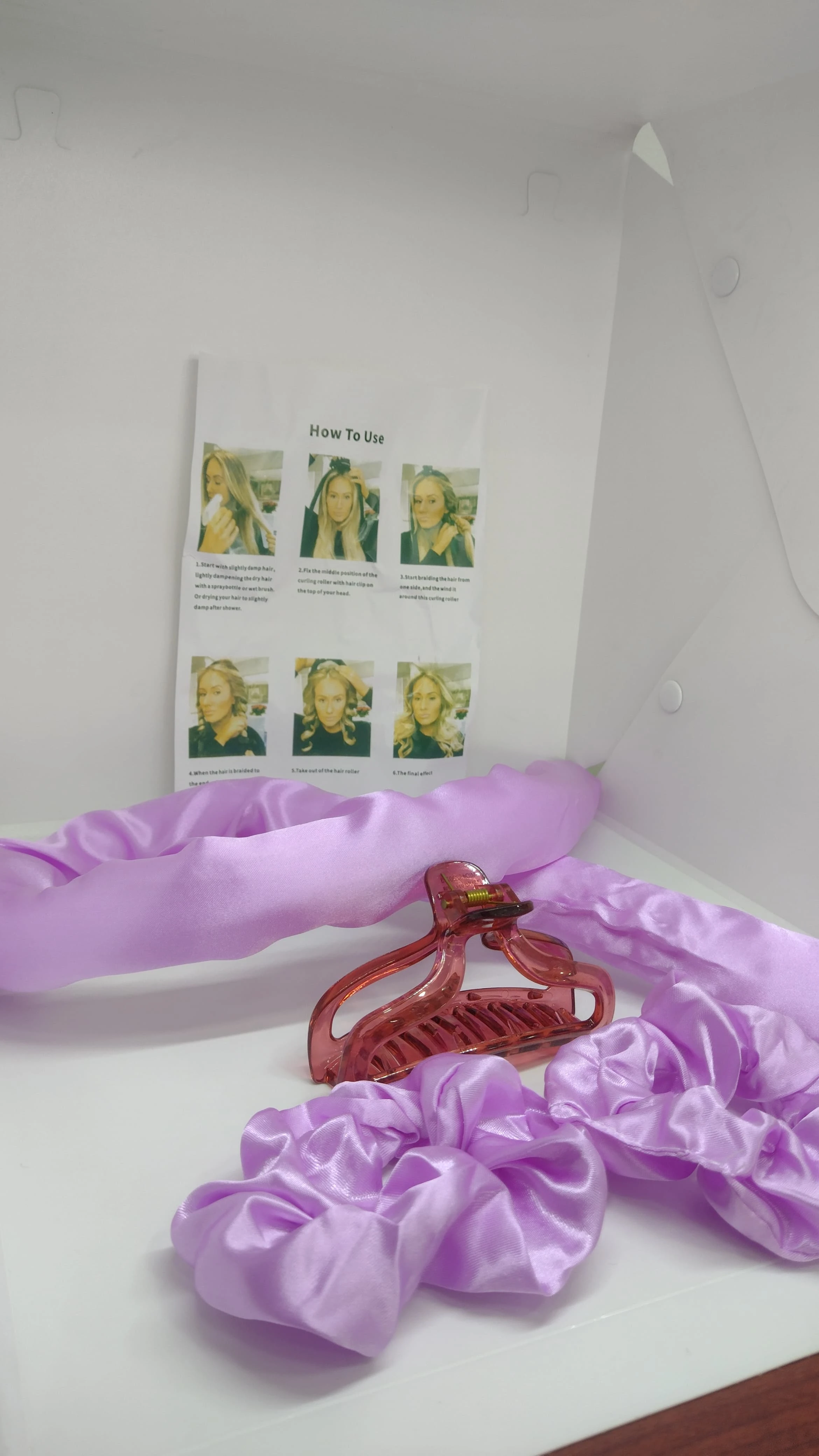 Set de dos onduladores de pelo con cerámica y diademas en color lila, sobre fondo blanco con instrucciones visibles.