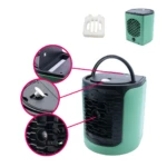 Ventilador enfriador portátil color menta con asa negra, detalles de rejilla, tapa y filtro incluidos.
