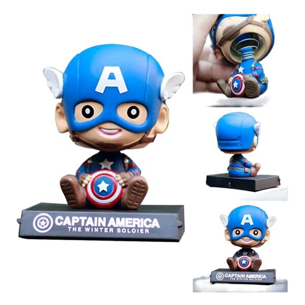 Figura de Capitán América con base para móvil, color azul y rojo, con escudo en el pecho y base negra con logo. Incluye vista trasera y detalle del soporte para teléfono.