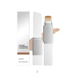 Base líquida vegana con cambio de color, presentación en tubo blanco con aplicador de cerdas y muestra de tono beige claro.