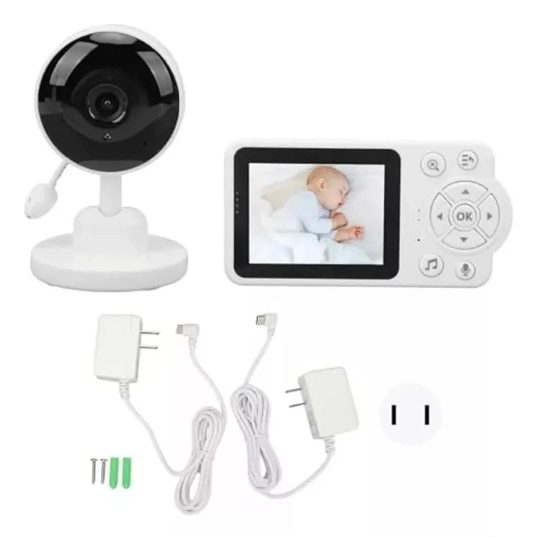 Monitor de bebé blanco con cámara esférica negra, pantalla mostrando a un bebé durmiendo, controles táctiles y accesorios incluidos: cargadores, cables y tornillos.