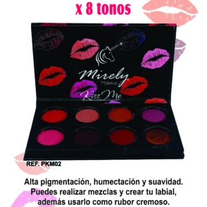 Paleta de labiales Kiss Me con 8 tonos cremosos, presentada en caja abierta mostrando los colores y diseño con labios estampados.