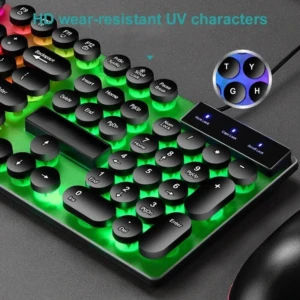 Teclado JG-666 con teclas redondas ergonómicas, iluminación LED verde y panel multimedia lateral.