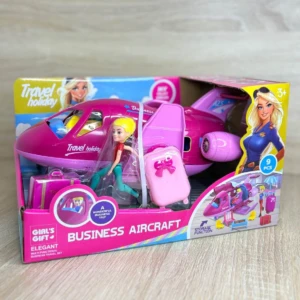 Juguete de Barbie en caja rosa con avioneta, maleta y figura de piloto; incluye accesorios para juego de rol en viajes de negocios.