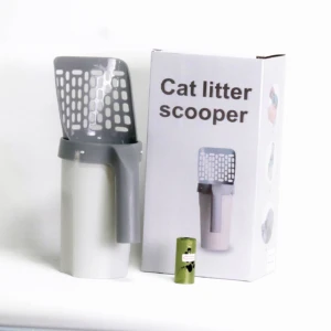 Pala para arena de gato con soporte y bolsa de repuesto, color gris y blanco, junto a su empaque.