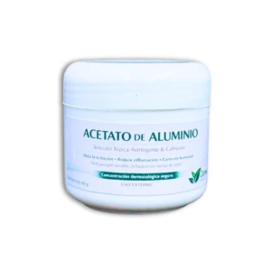 Jarrón blanco de acetato de aluminio, crema tópica de 60 g con etiqueta que indica concentración dermatológica segura y uso externo.