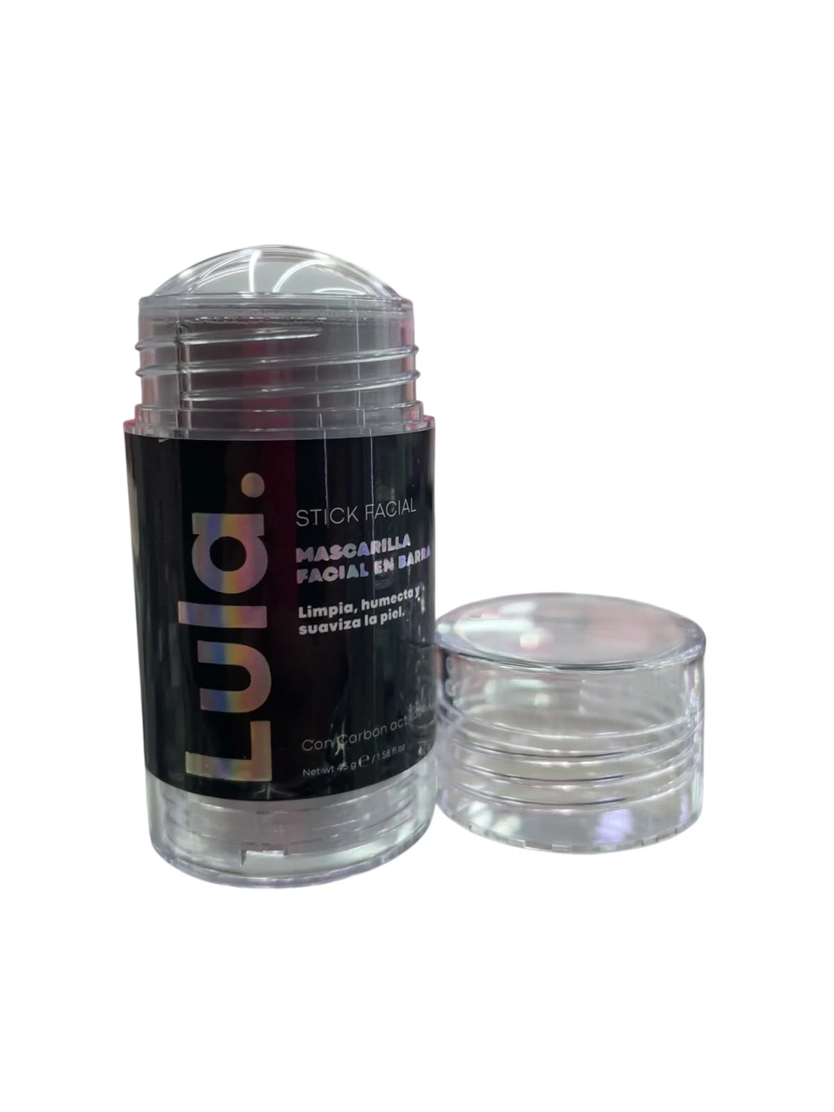 Barra facial de limpieza de la marca Lula, con tapa transparente y etiqueta negra que muestra el nombre del producto y su función.