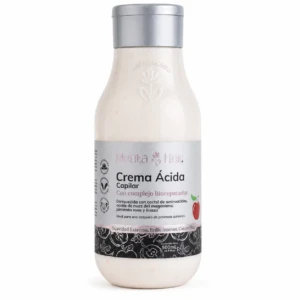 Botella de crema ácida capilar reparadora con aceites naturales, presentación de 500 ml, etiqueta blanca con detalles en negro y rojo, tapa plateada.