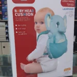 Almohada mochila azul con diseño de elefante para bebé, en caja de presentación con del producto y bebé usando el accesorio.