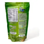Saco verde de 200g del batido Fibro Verde, con etiqueta mostrando información nutricional, ingredientes y instrucciones de uso. Incluye de vegetales frescos y vaso con bebida verde.