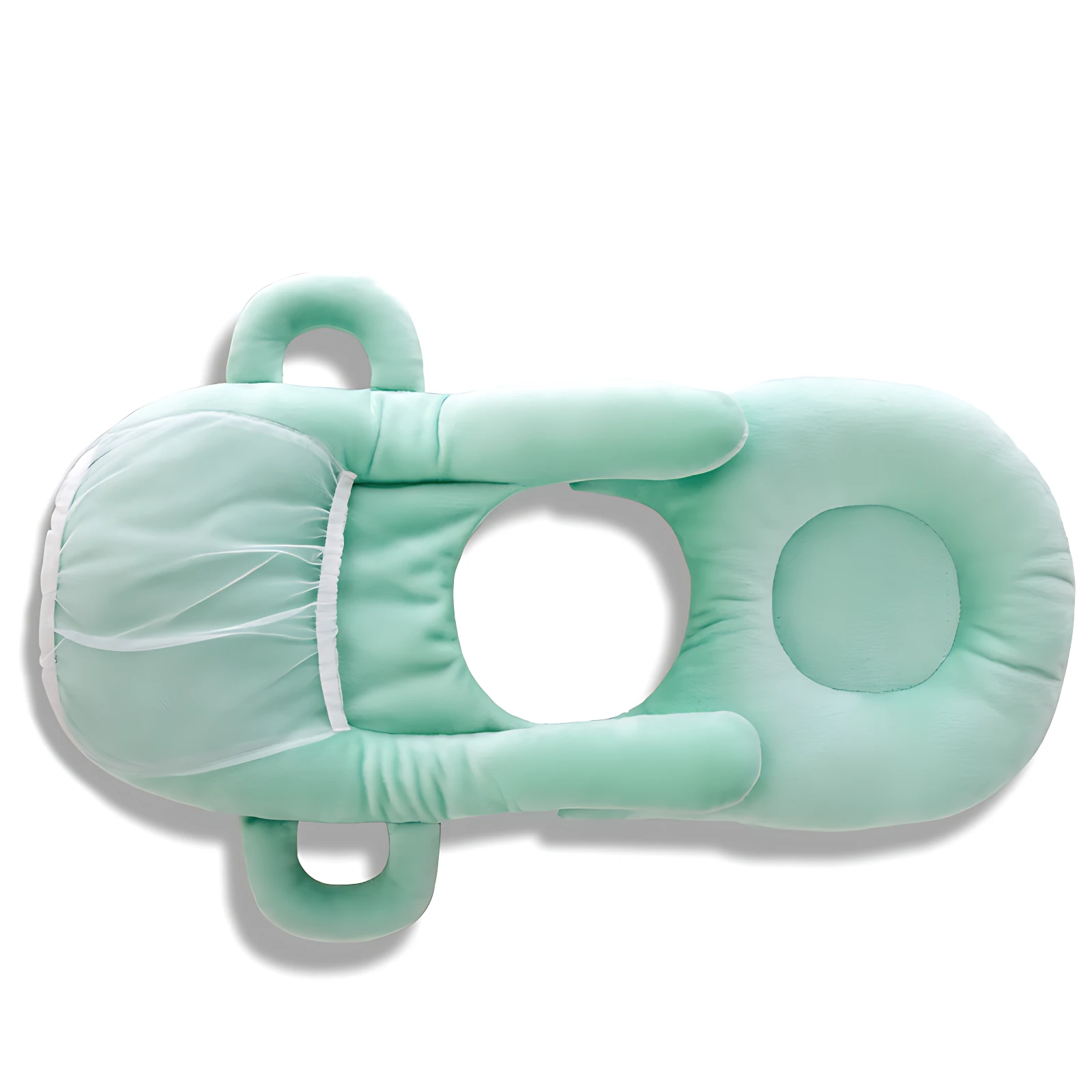 Cojín ergonómico para lactancia en color menta, con malla transparente en la zona frontal y asas laterales para facilitar el manejo.