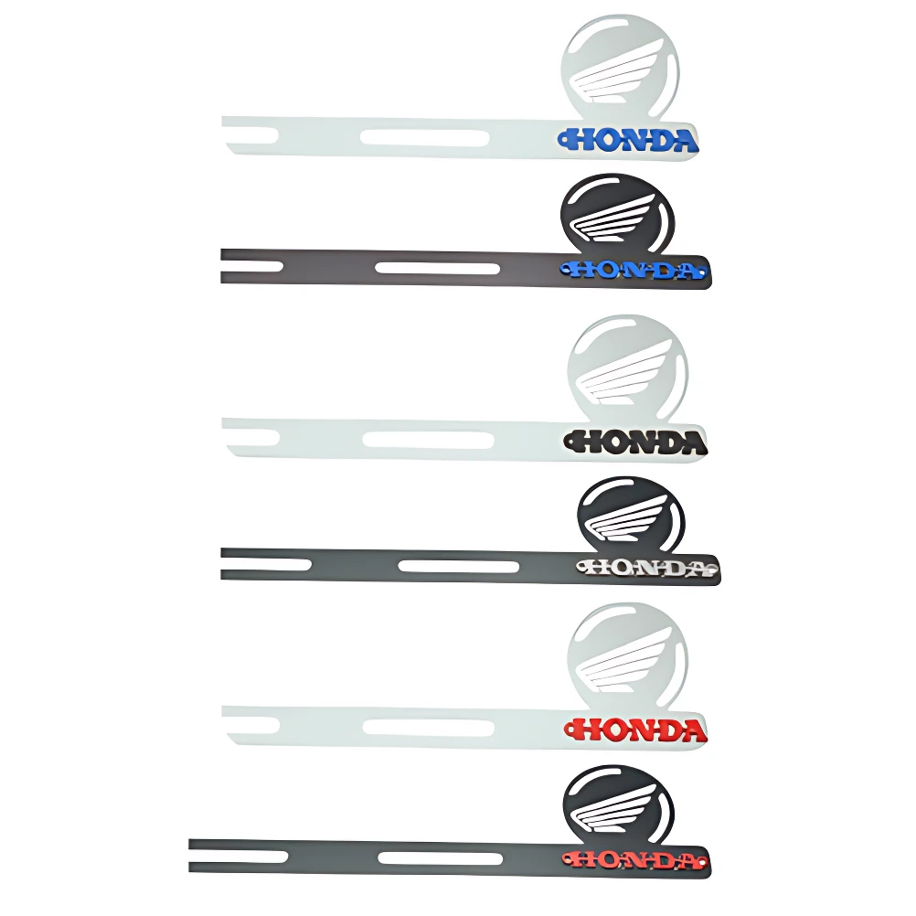 Set de dos porta placas para resonador Honda XR en acero inoxidable, con logotipo Honda en colores azul, negro y rojo sobre fondo plateado.