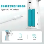 Nebulizador inalámbrico blanco con batería recargable tipo C y dos pilas AA, mostrando su compartimento abierto y cable de carga.