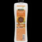 Botella blanca de 750 ml de tratamiento capilar Natural Cosmetics con etiqueta naranja, mostrando coco y palmera.