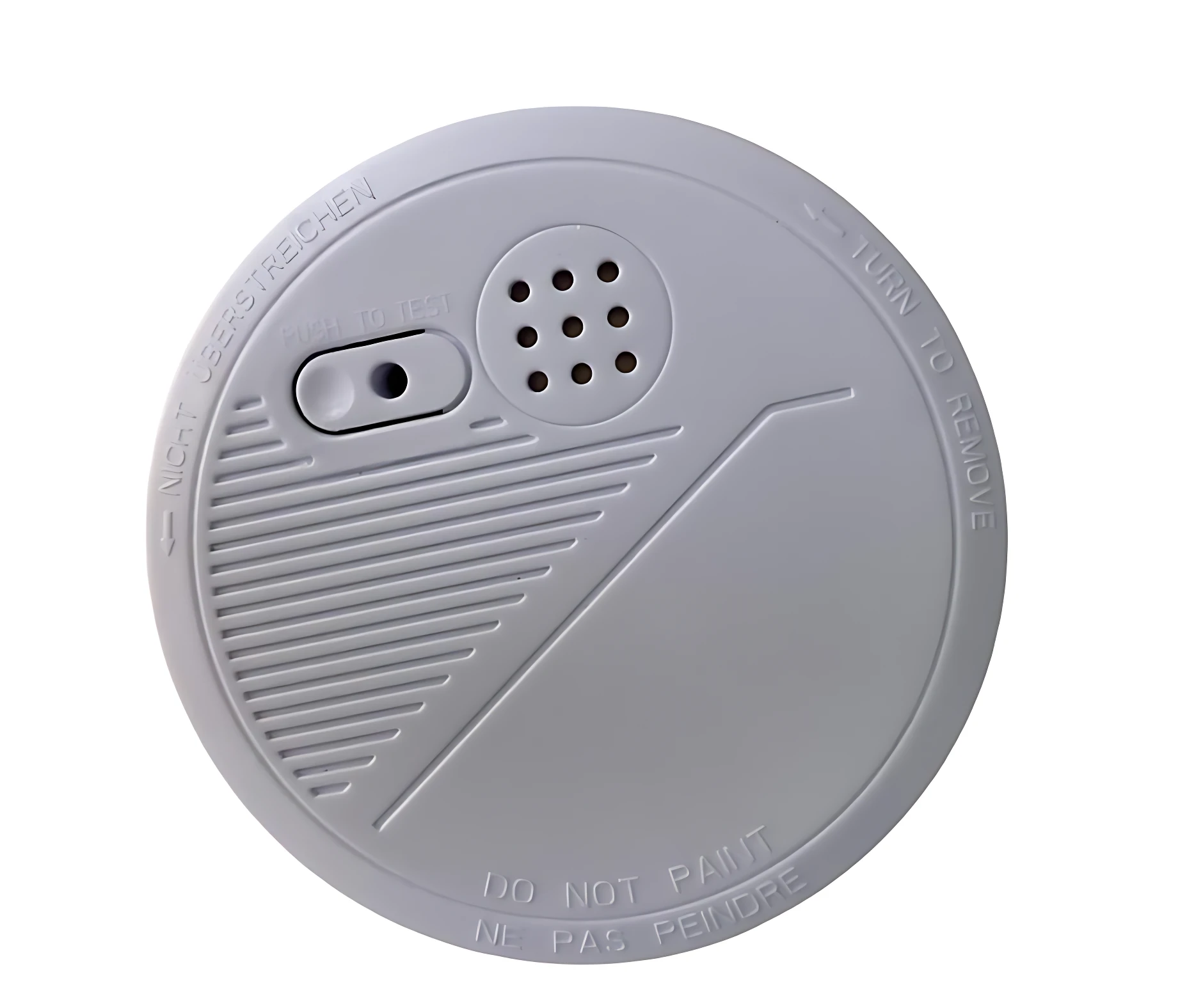 Sensor de humo fotoeléctrico circular en color gris claro, con superficie texturizada y detalles funcionales visibles como orificios de ventilación y botón de prueba.