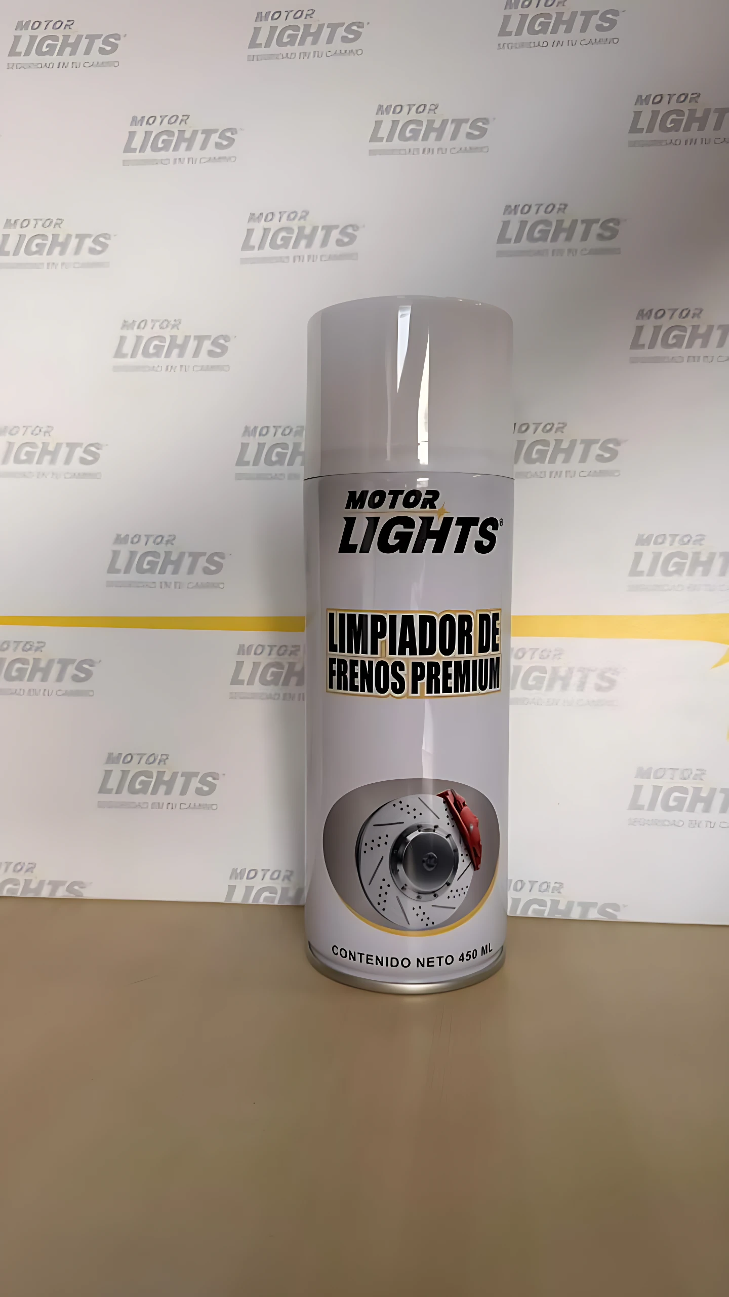Botella de limpiador de frenos Motor Lights, presentación de 400 ml, con etiqueta blanca y diseño circular que muestra disco de freno.