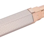 Trimer recargable en rosa dorado con textura de diamantes, cabezales intercambiables para perfilado de cejas, barba y vello corporal.