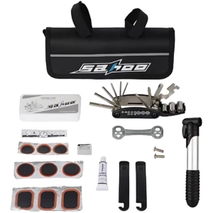 Kit de herramientas para bicicleta con bolsa negra, llave multifunción, bomba de aire, parches, lubricante y accesorios organizados.