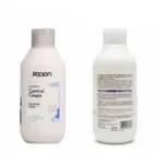 Dos botellas blancas de shampoo La Poción Control Caspa de 450 ml, una muestra el frente con etiqueta azul y otra la parte posterior con información.