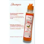 Shampoo revitalizante de 200ml con romero y caléndula para cabello maltratado, botella naranja con dispensador, sin sal ni parabenos.