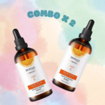 Set de dos serums faciales Bioaqua Vitamina C en frascos ámbar con gotero y diseño de naranja sobre fondo de colores pastel.