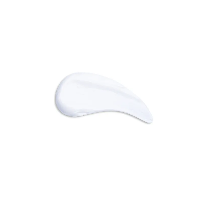Muestra de crema acondicionadora blanca y espesa, textura suave y brillante, ideal para el cuidado capilar.