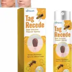 Spray para eliminar verrugas Tag Recede de 20 ml con extracto de veneno de abeja, caja y envase amarillo con de panal.