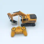 Excavadora de juguete a control remoto con brazo articulado - Estimula la coordinación motora mientras los niños juegan - Imagen 2