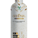 Botella blanca de 1000 ml con tapa gris, diseño dorado de hojas, marca Nutranova y etiqueta Serenia con jengibre y cúrcuma.