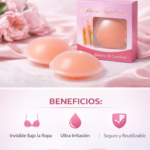 Pads de silicona para pezones color piel tono durazno, diseño redondo y reutilizable, con caja rosa y flores de fondo.