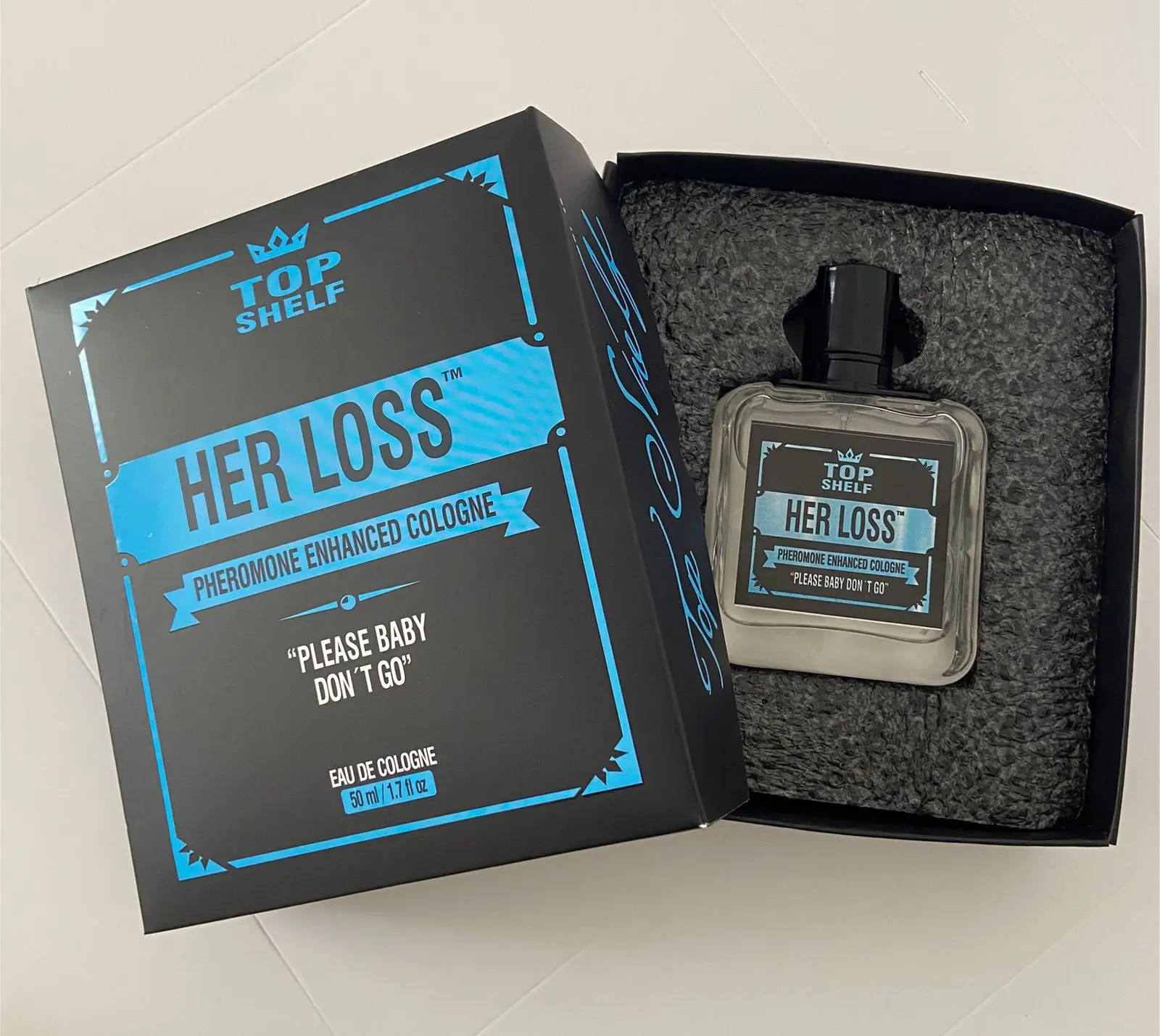 Colonia con feromonas Her Loss 50 ml para hombre - Potencia tu atractivo personal diariamente