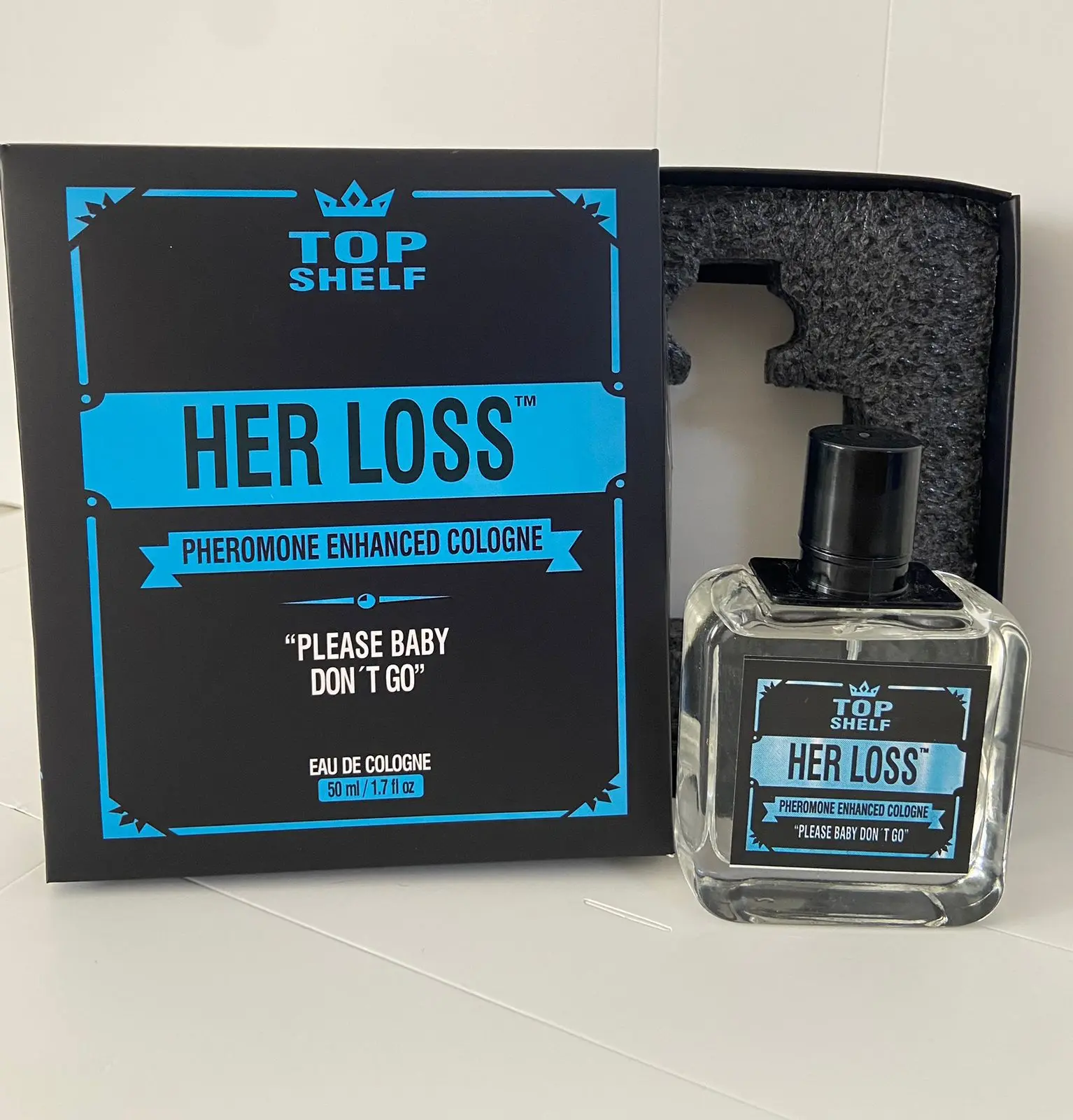 Colonia con feromonas Her Loss 50 ml para hombre - Potencia tu atractivo personal diariamente