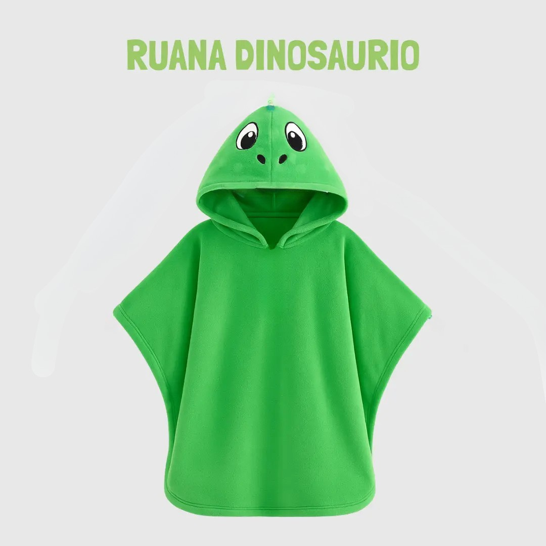 Ruana infantil de polar verde con capucha de dinosaurio con detalles de ojos y nariz, diseño tipo poncho sin mangas.