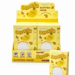 Display exhibidor con dos cajas y una unidad suelta de papel absorbente facial de banana, amarillo, con dispensador circular y 100 hojas de 90x60 mm.