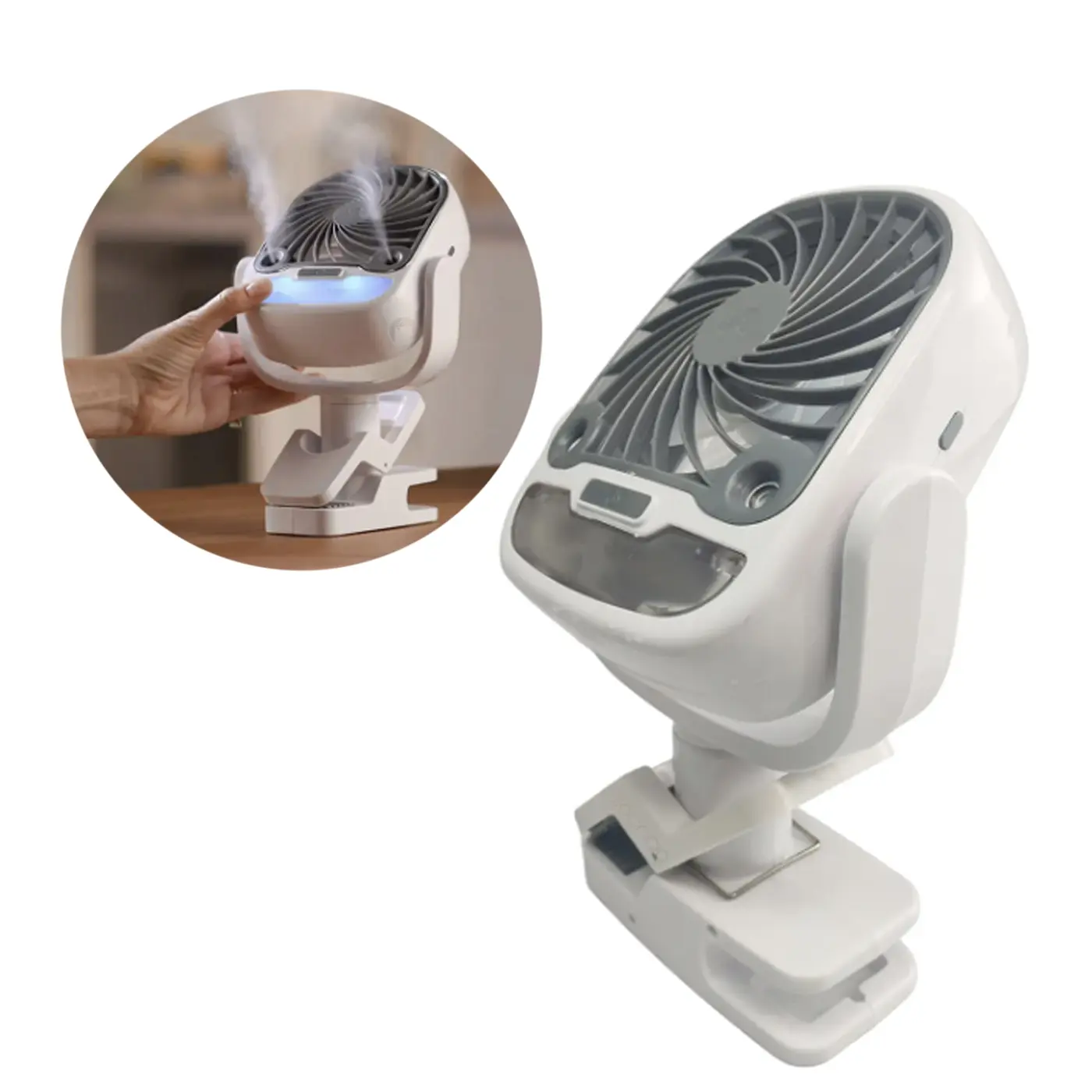 Mini ventilador blanco portátil con humidificador difusor, luz LED, aspas grises y base con clip ajustable, mostrando vapor en miniatura.
