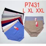 Panty reductor moldeador sin costuras en varios colores, tallas L, XL y XXL, exhibidos doblados en pila y dos desplegados sobre superficie clara.